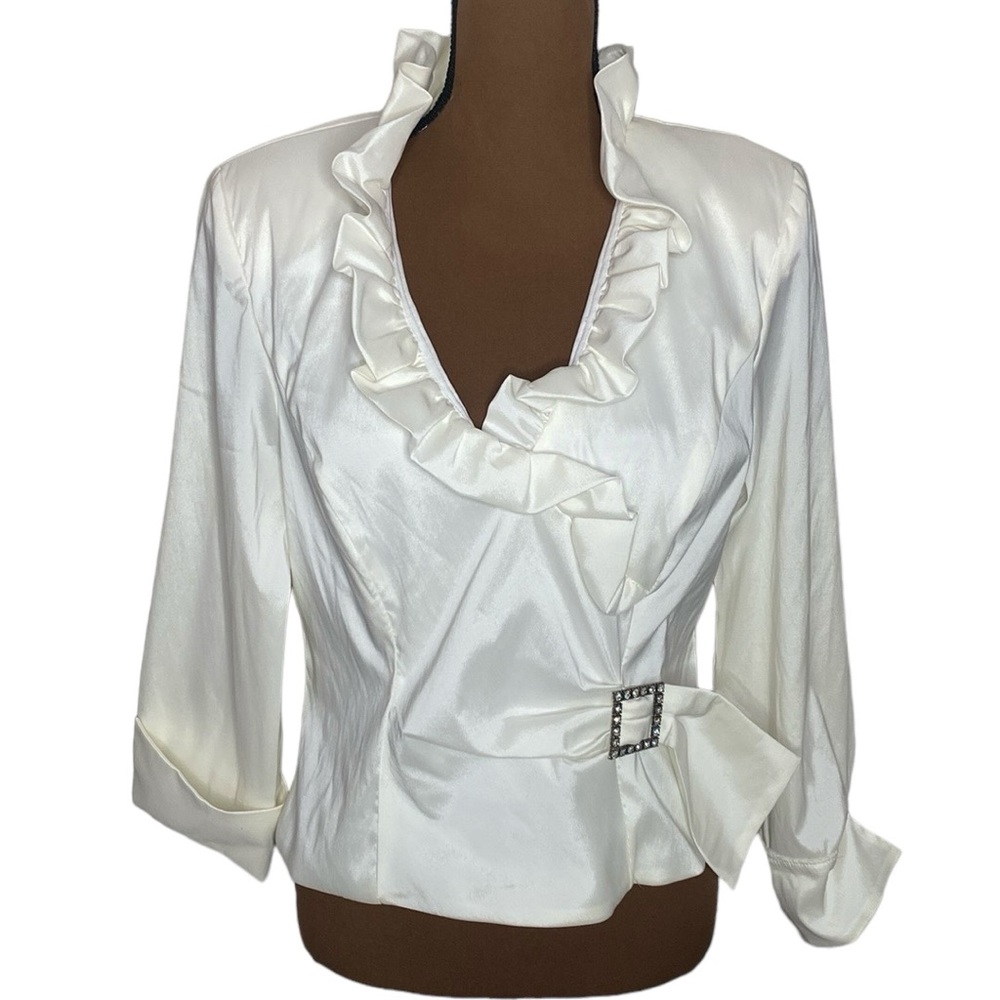 XSCAPE ivory ruffled special occasion top with rhinestone button buckle size 12